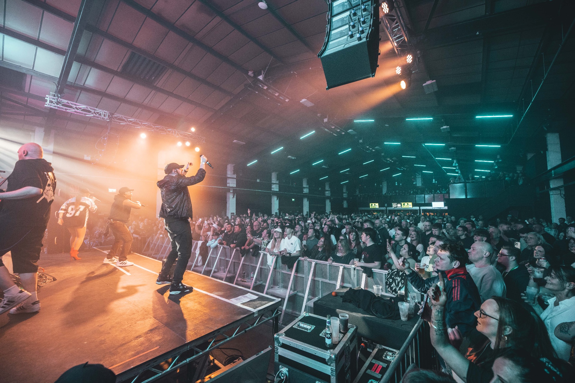 The Eminem Experience live band performing to a packed crowd